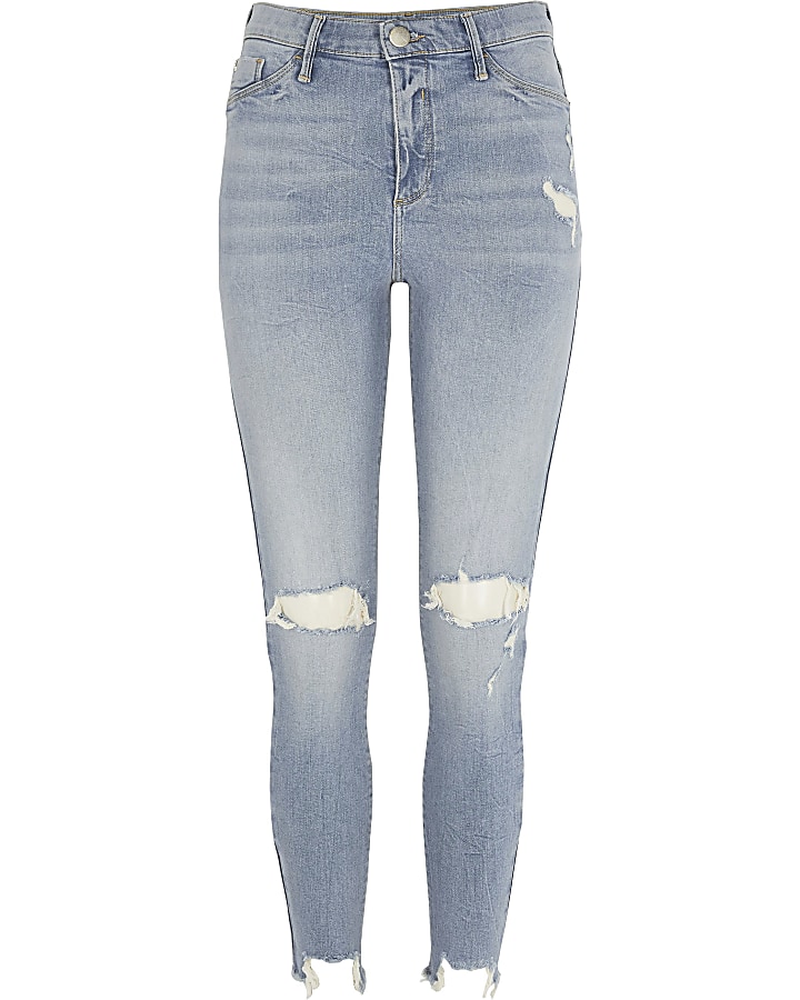 Light blue ripped Molly mid rise jeggings