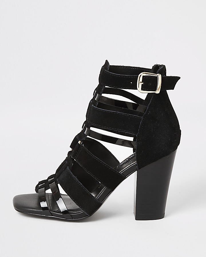 Black leather strappy heeled sandals