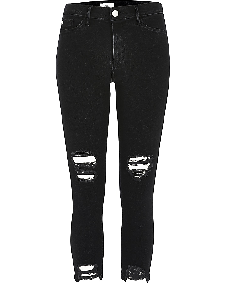 Petite black ripped Molly mid rise jeans
