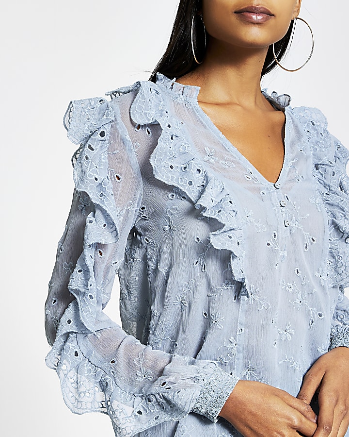 Blue broderie frill long sleeve blouse