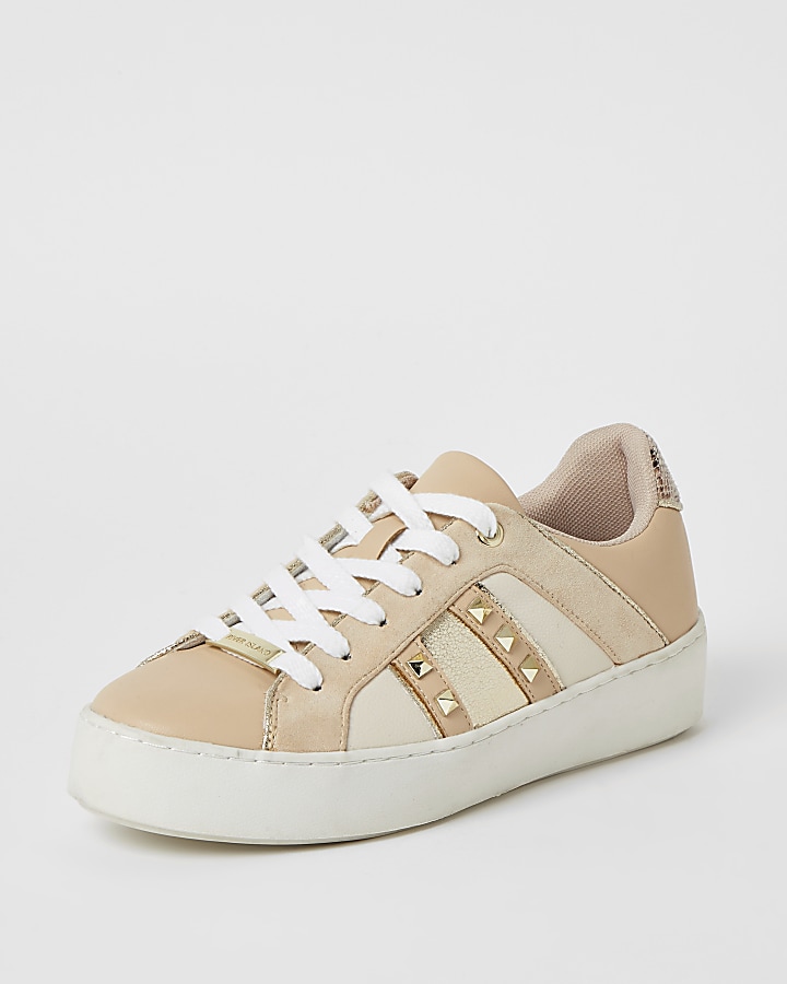 Beige studded lace-up trainers
