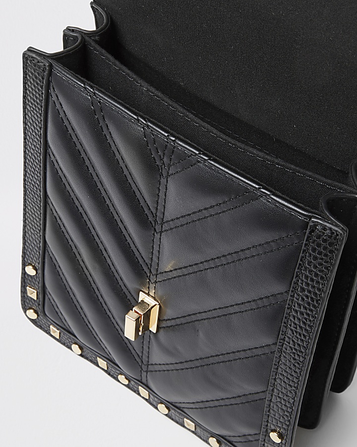 Black studded quilted cross body bag