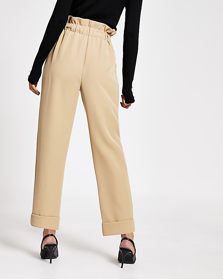 Beige buckle side tapered peg trousers