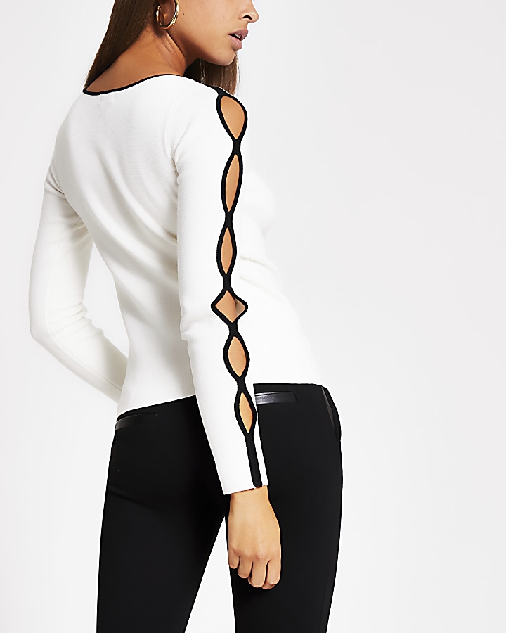 Cream cut out long sleeve knitted top