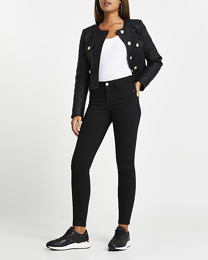 Black mid rise skinny jeans | River Island