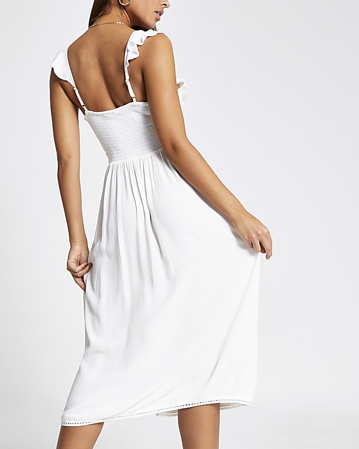 White embroidered frill V neck beach dress