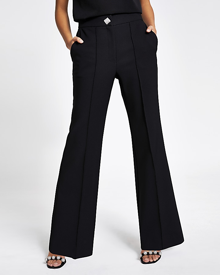Black flare embellished button trousers