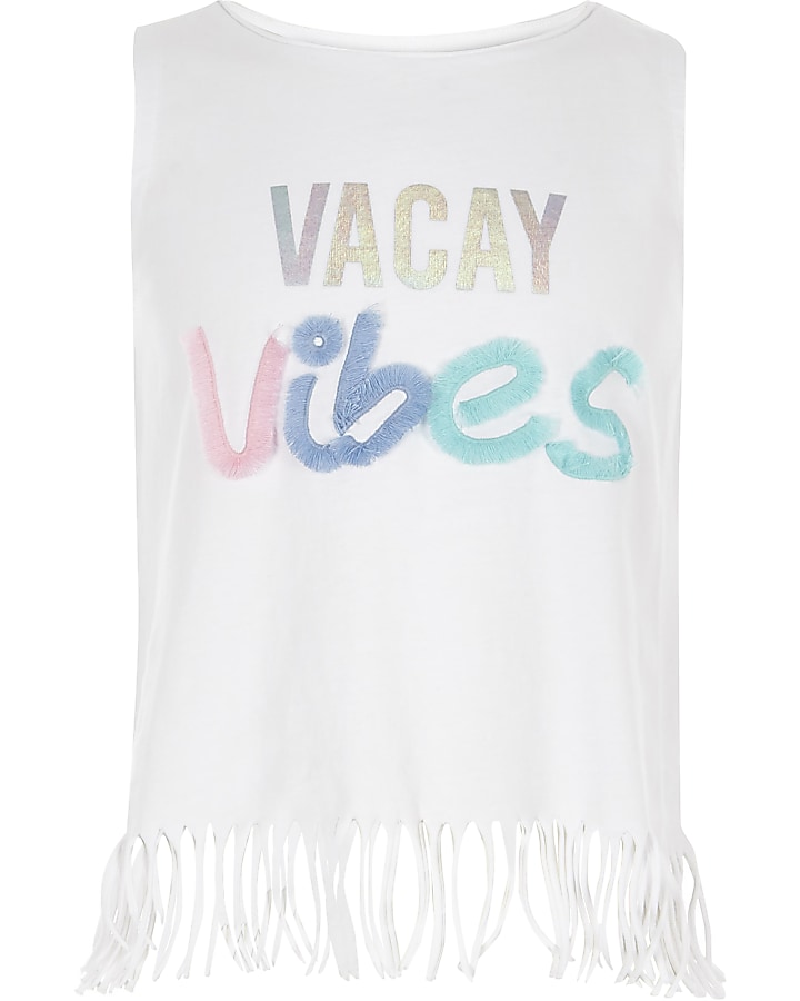 Girls white ‘Vacay vibes’ fringe tank top