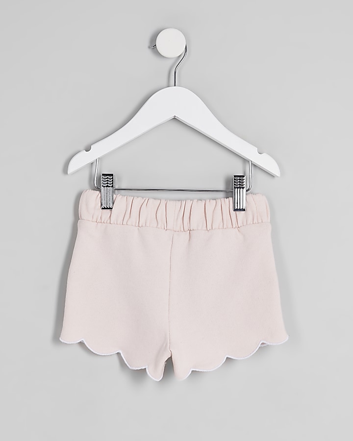 Mini girls pink scalloped hem shorts