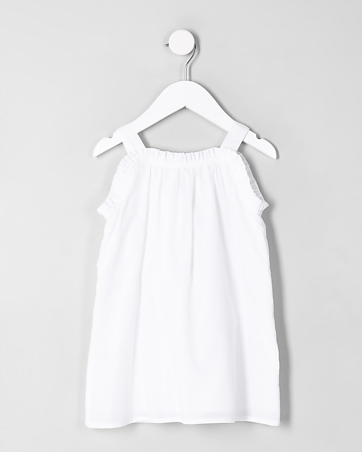 Mini girls white pom pom trim trapeze dress