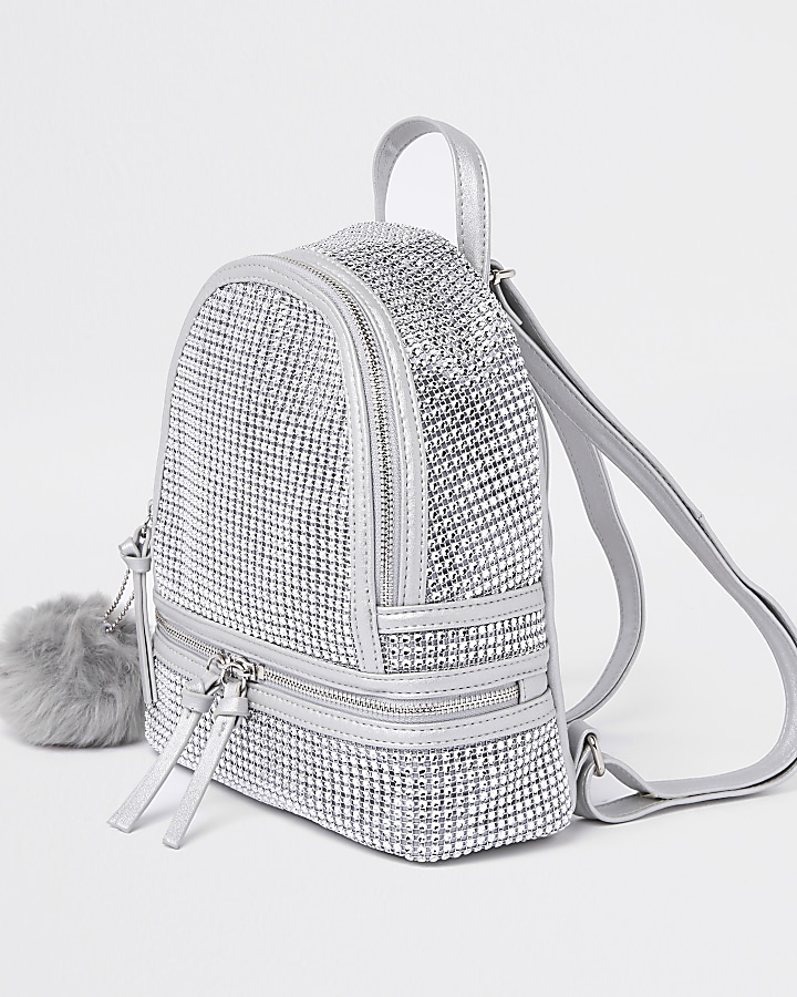 Silver embellished faux fur pom pom backpack