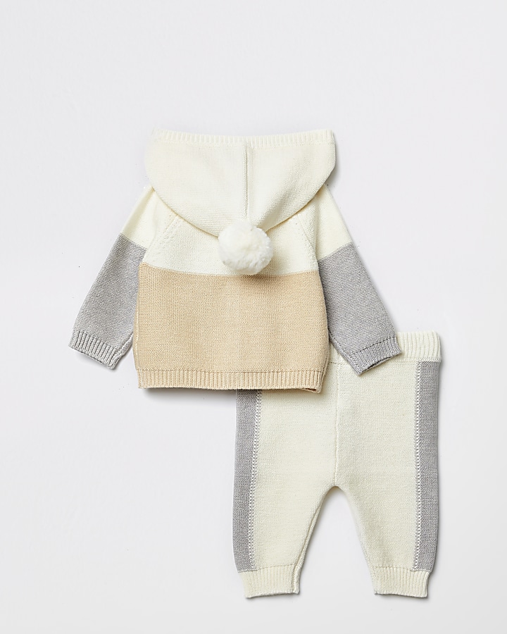 Baby cream blocked knitted cardigan outfit