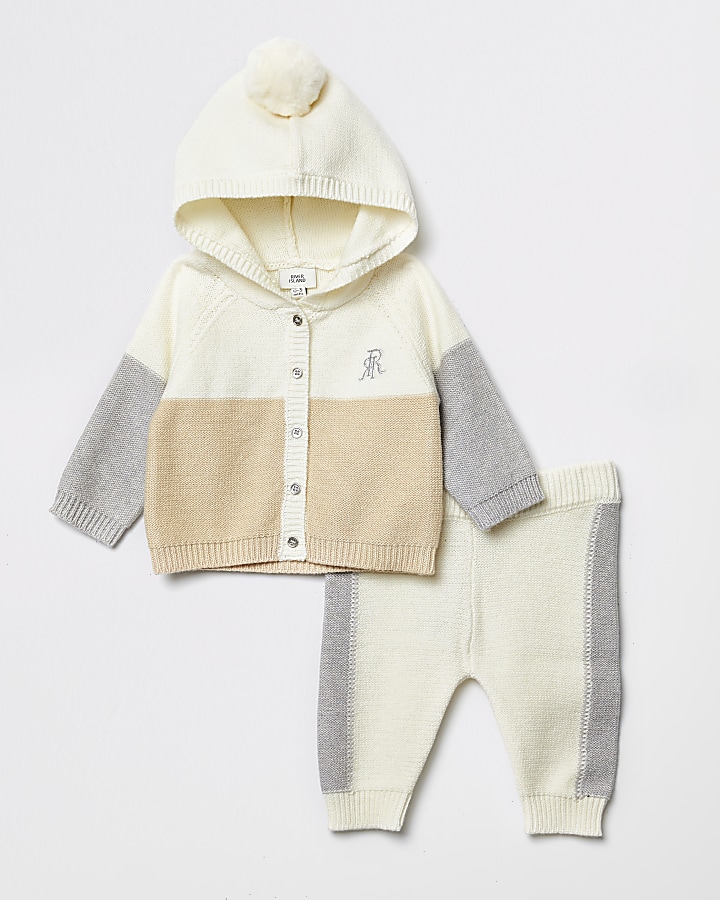 Baby cream blocked knitted cardigan outfit