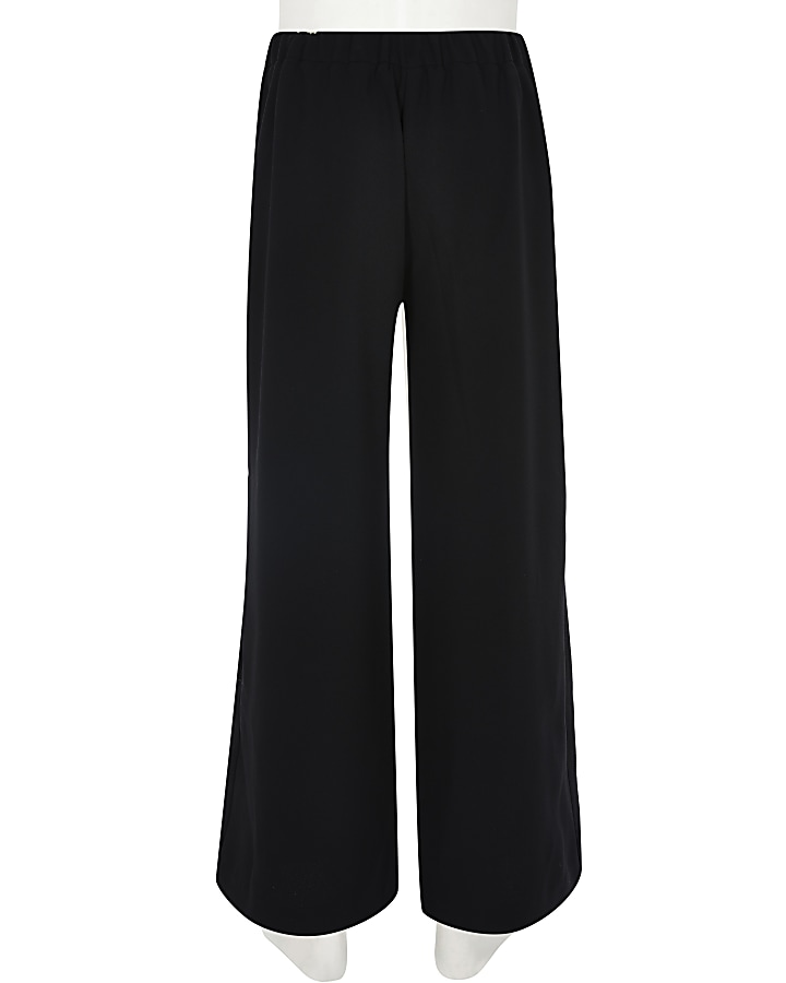 Girls black button front trousers