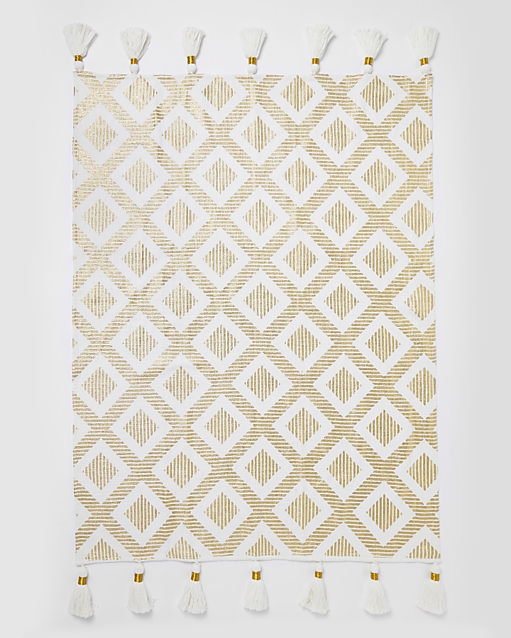 Cream and gold print throw with tassels