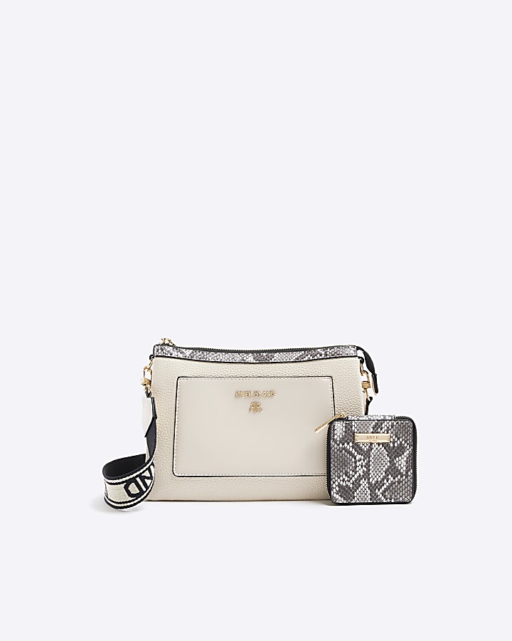 Cream snake print cross body bag