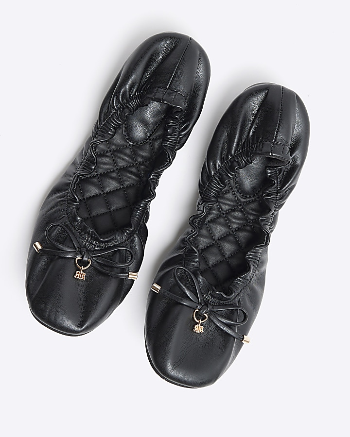 Black elasticated ballet shoes