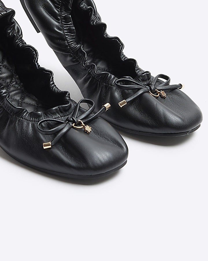 Black elasticated ballet shoes