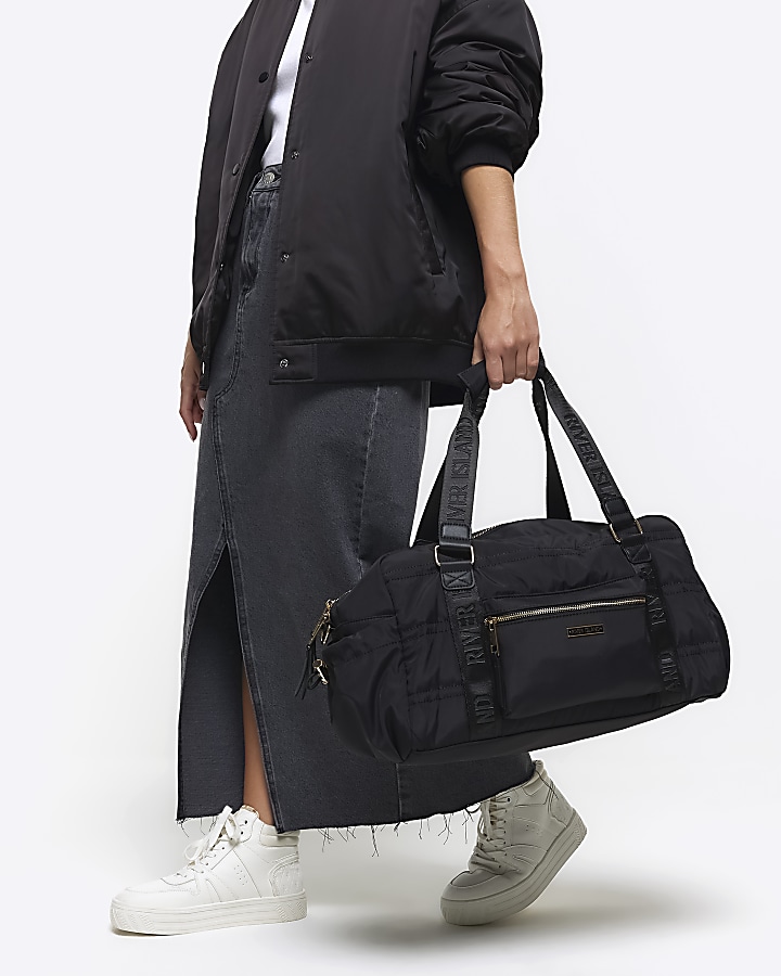 Black zip pocket travel bag River Island