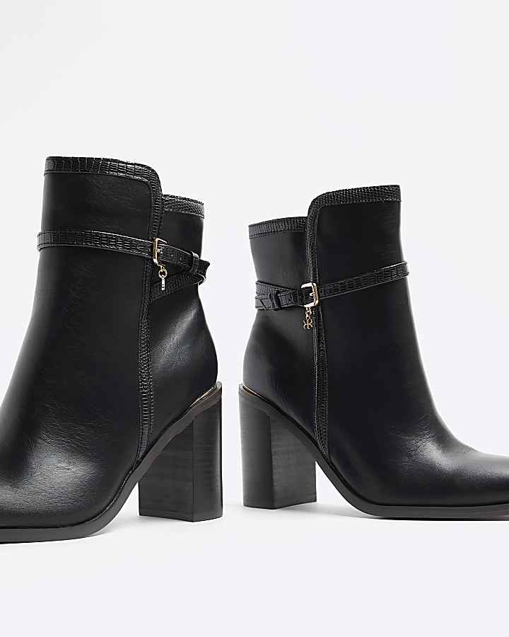 Black buckle heeled boots