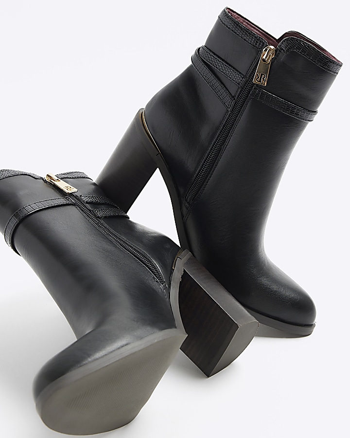 Black buckle heeled boots