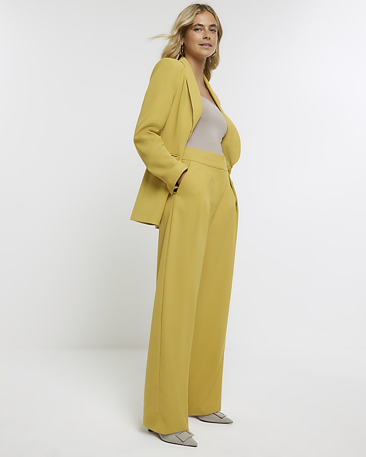 Yellow pleated wide leg trousers