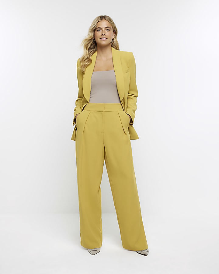 Yellow pleated wide leg trousers | River Island
