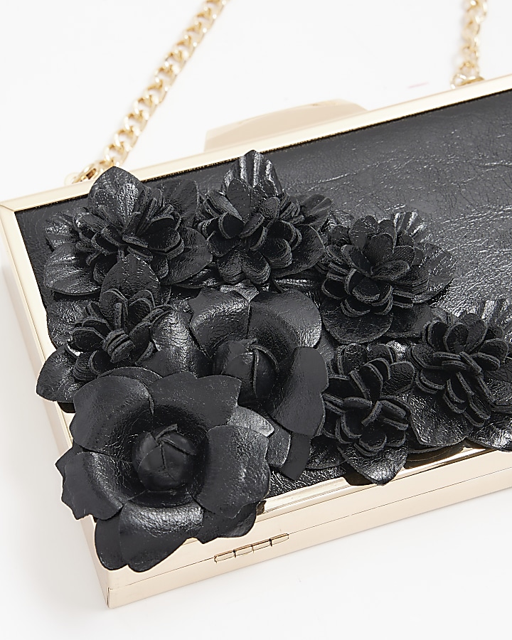 Black flower detail clutch bag