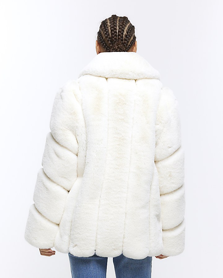 Cream panelled faux fur coat
