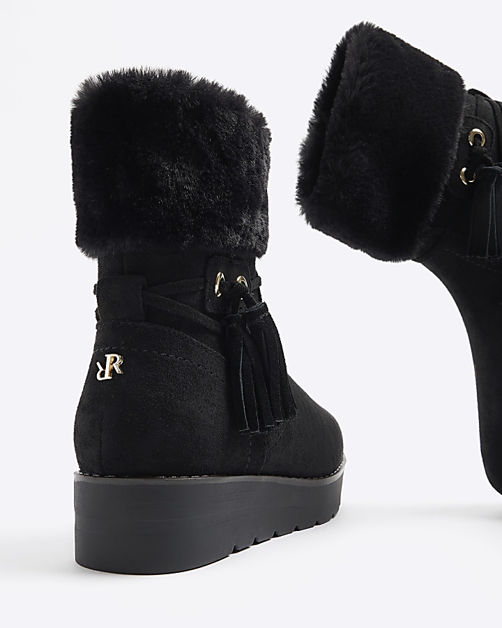 Black faux fur lining wedge boots
