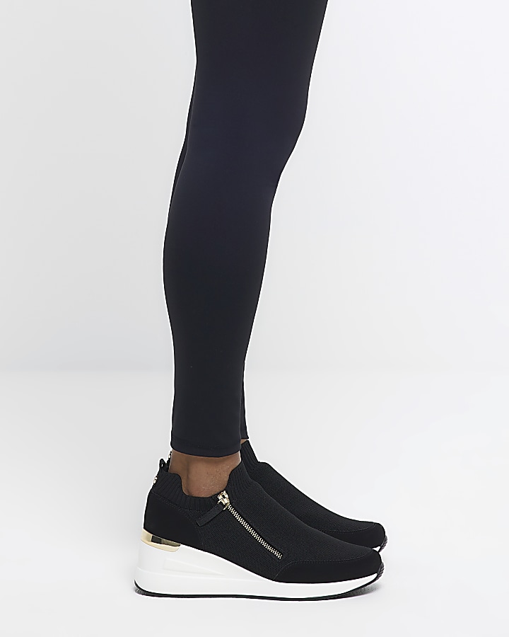 Black wide fit slip on wedge trainers