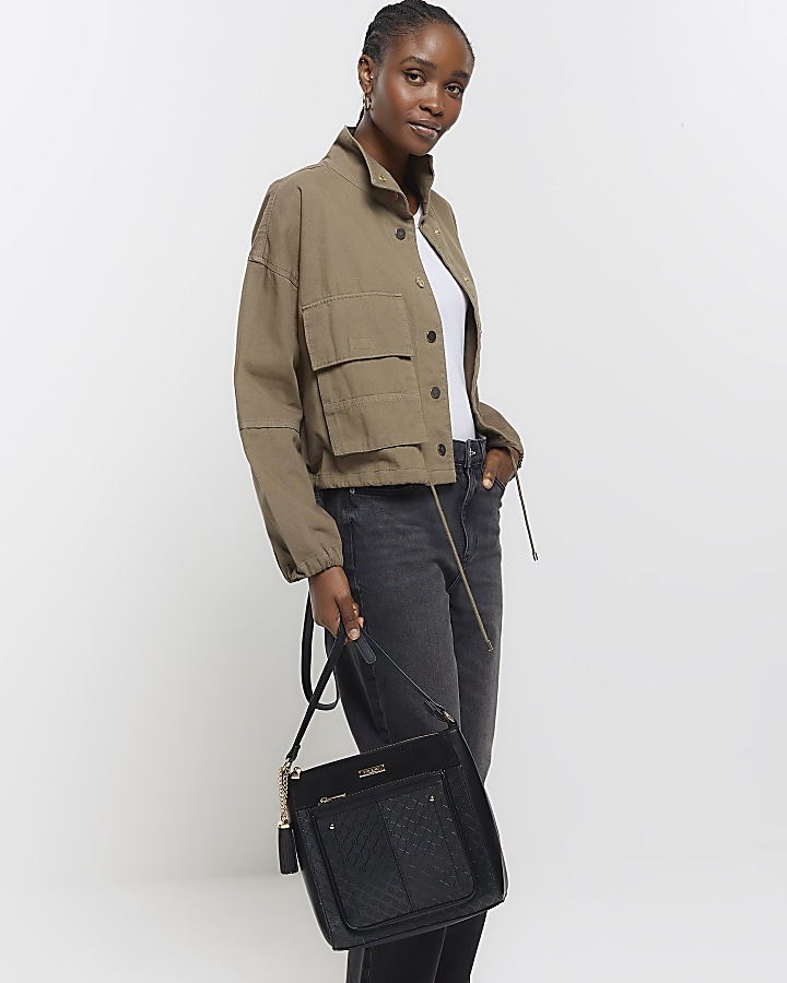 Black RI monogram messenger bag River Island