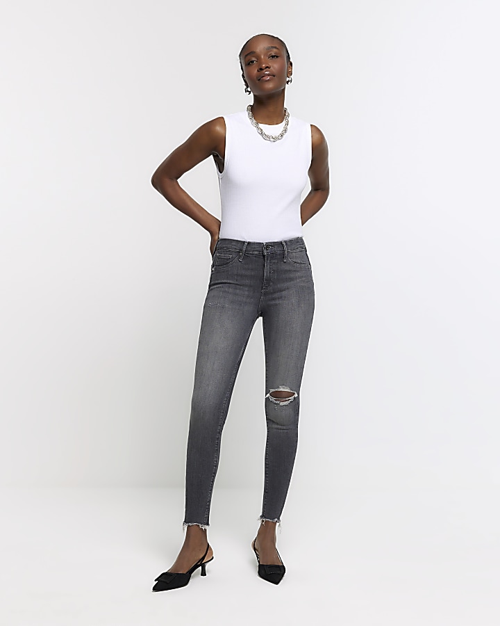 Ripped bum hot sale skinny jeans