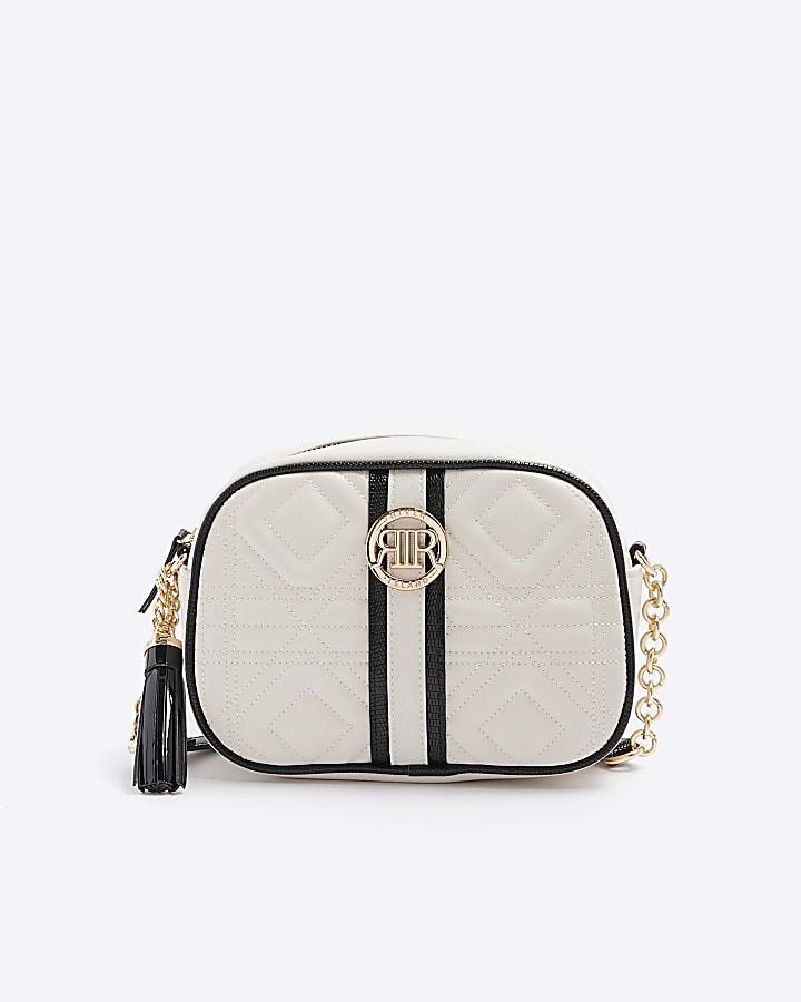 Cream quilted boxy cross body bag | River Island
