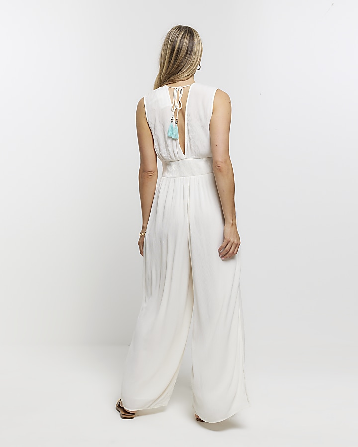 Cream embellished plunge jumpsuit River Island