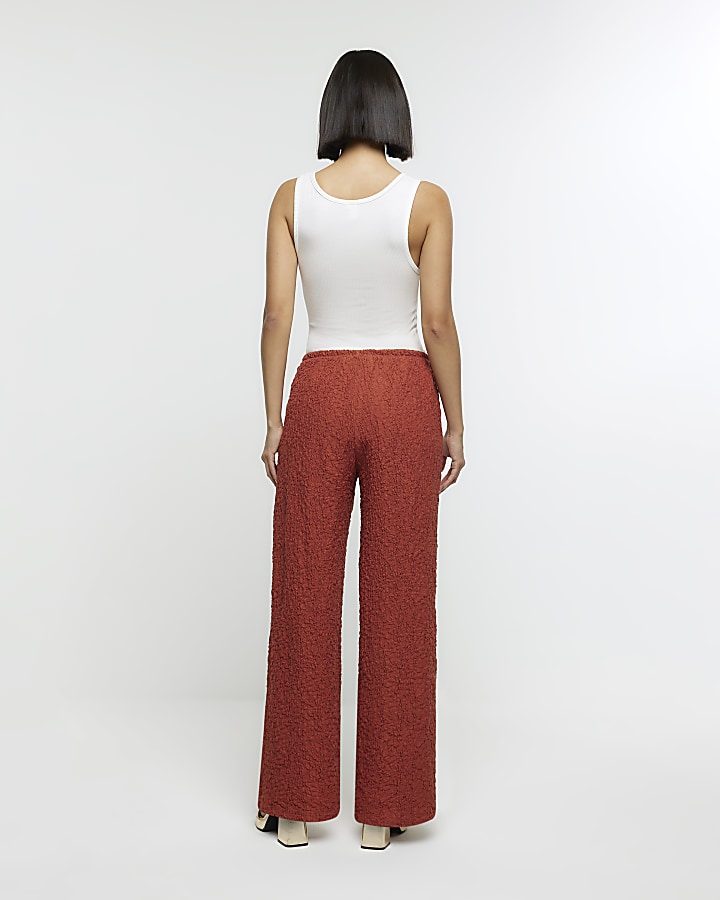 Rust textured wide leg trousers