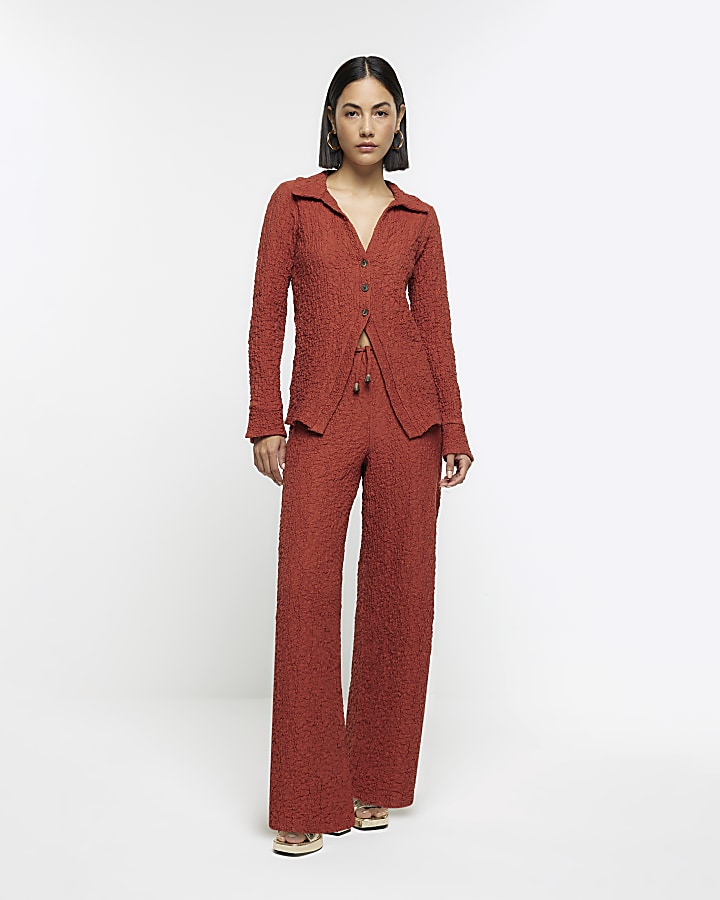 Rust textured wide leg trousers