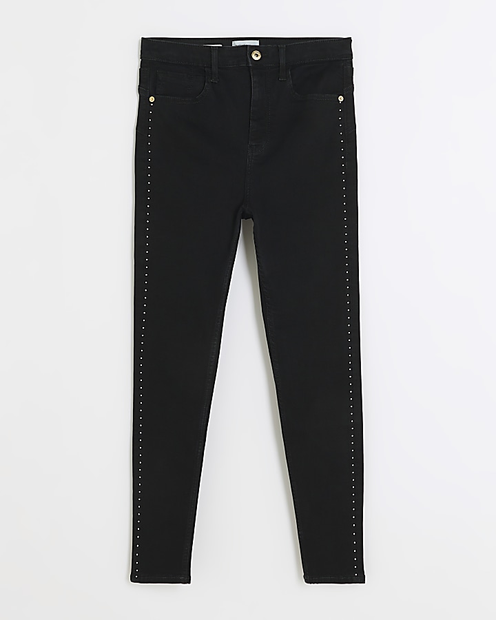 Black high waisted stud skinny jeans