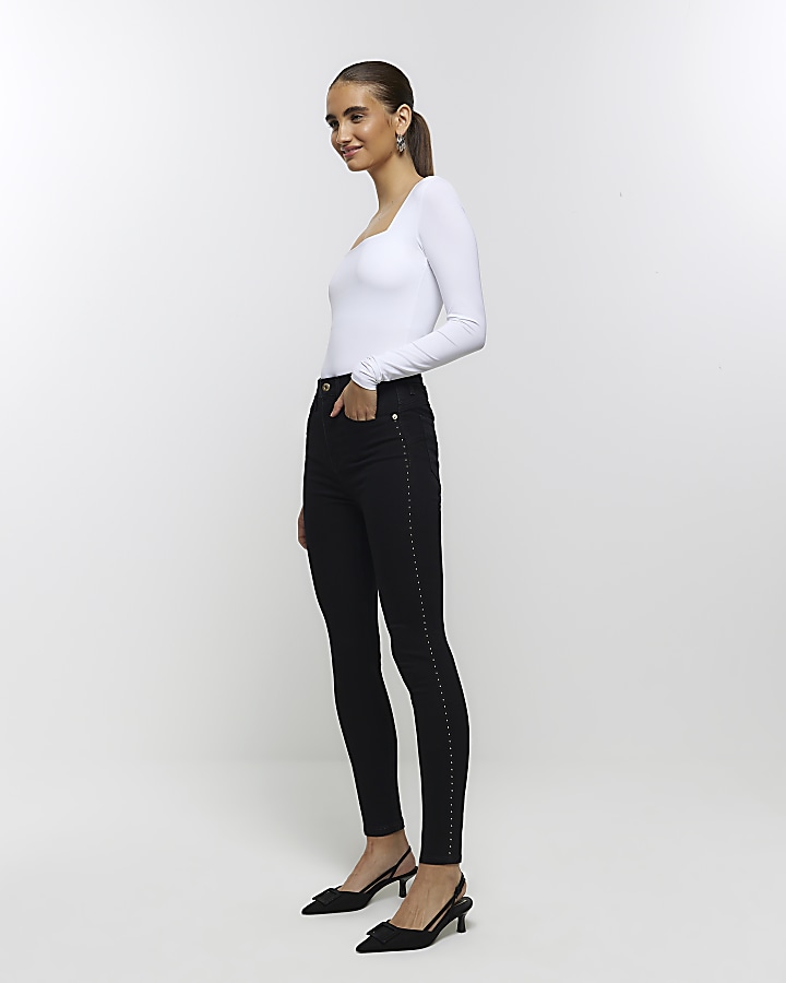 Black high waisted jeans with store belt holes