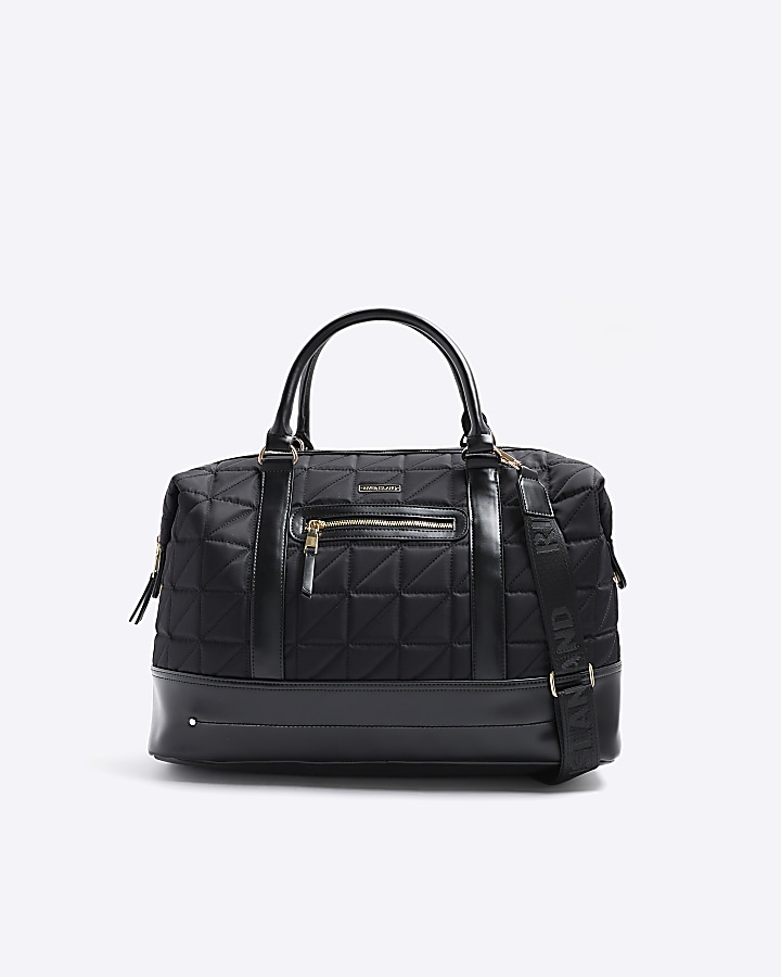 Black quilted zip travel bag