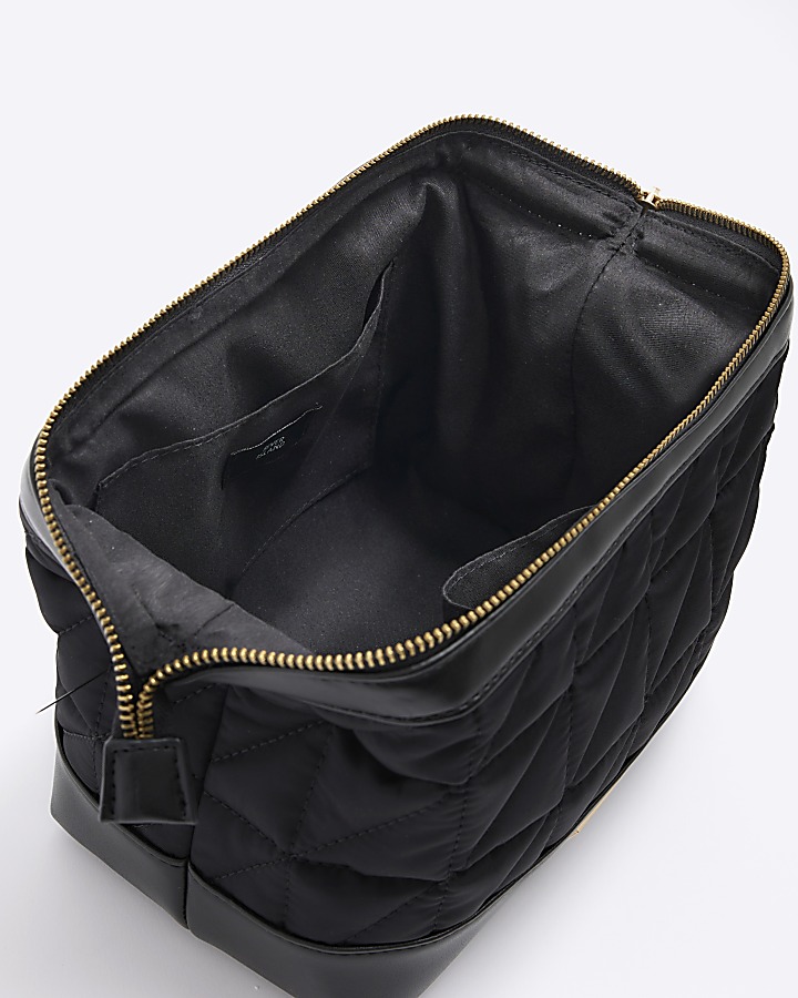 Black quilted makeup bag