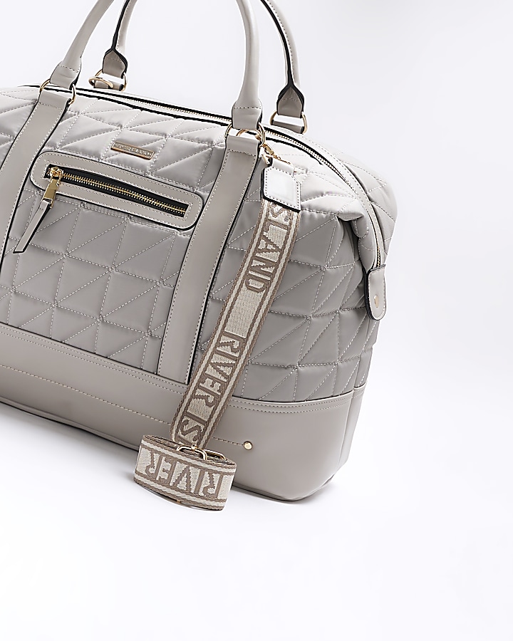 Grey quilted zip travel bag River Island