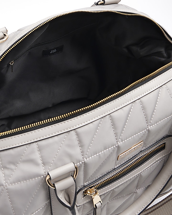 Grey quilted zip travel bag