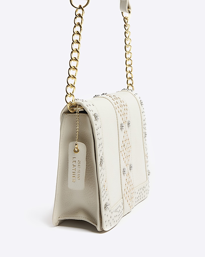 Cream leather studded cross body bag River Island
