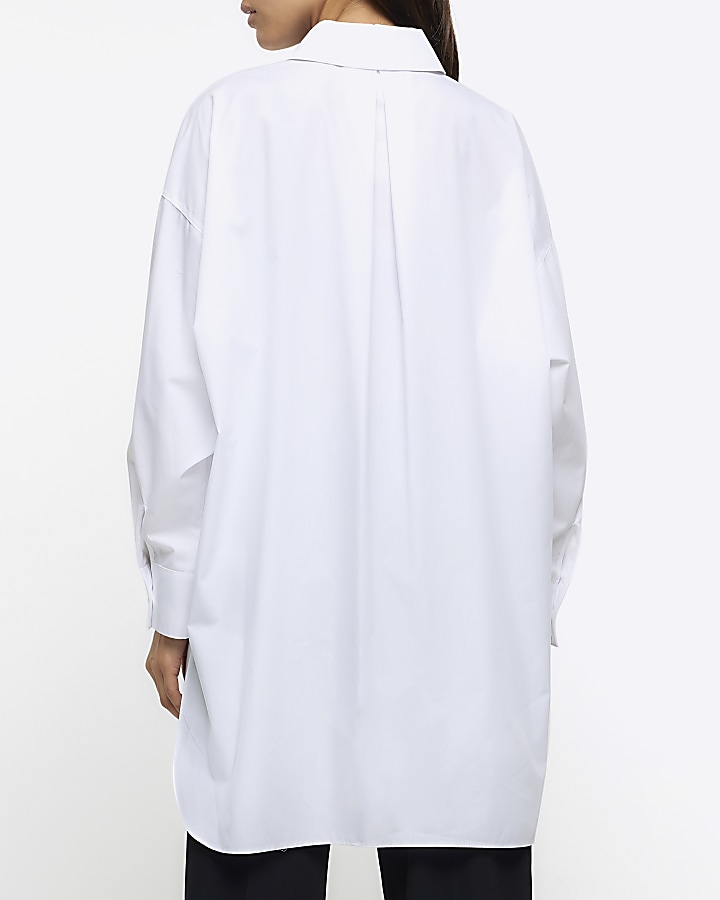 White oversized split hem shirt
