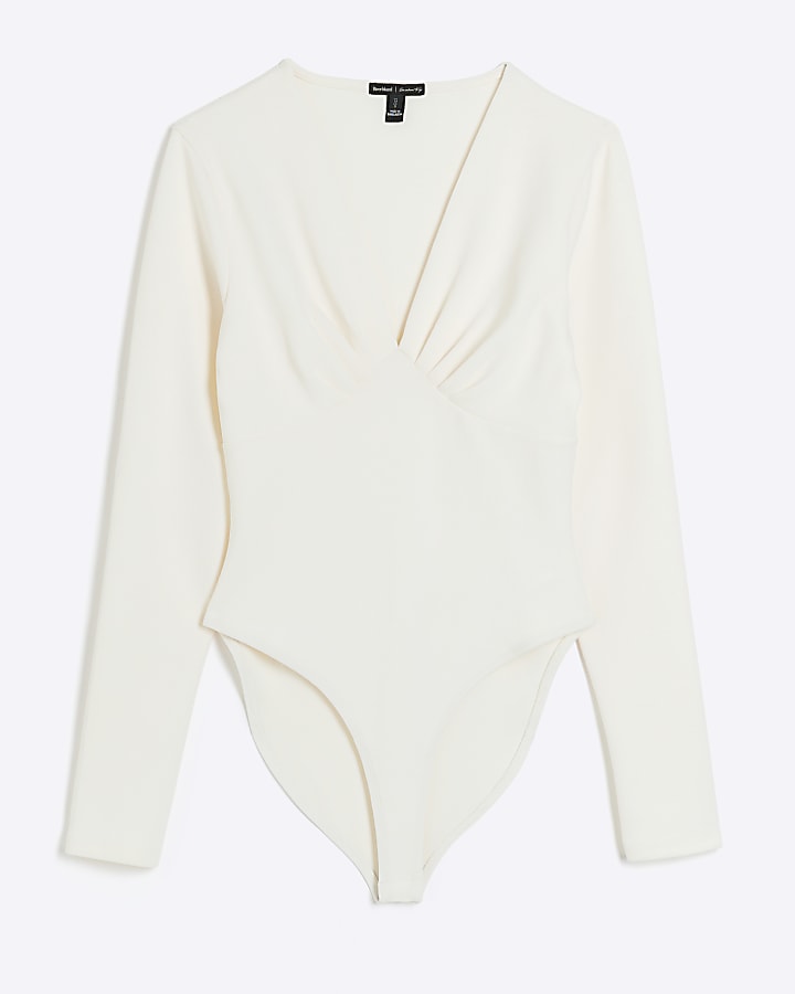 Cream plunge long sleeve bodysuit | River Island
