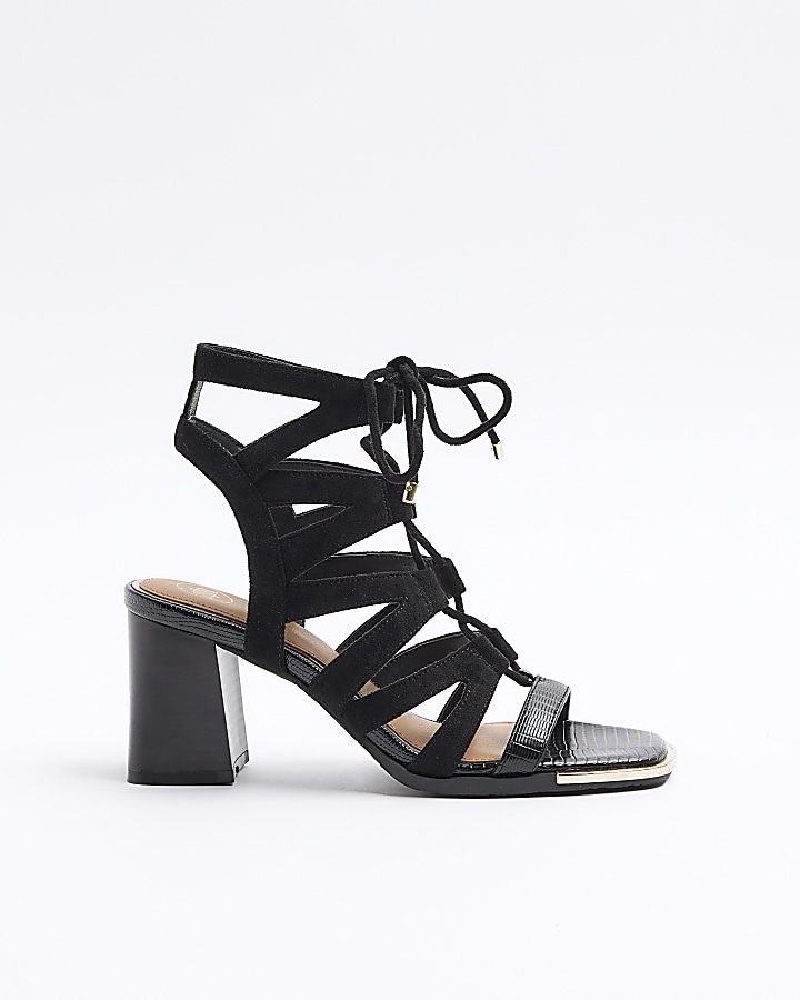 Black strappy heeled sandals