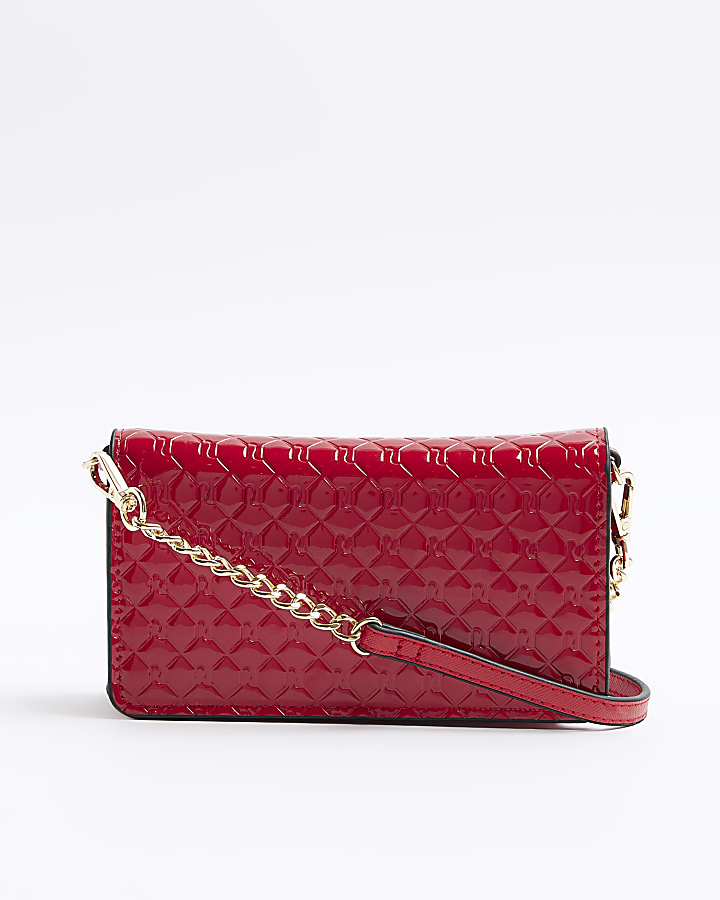Red embossed cross body purse