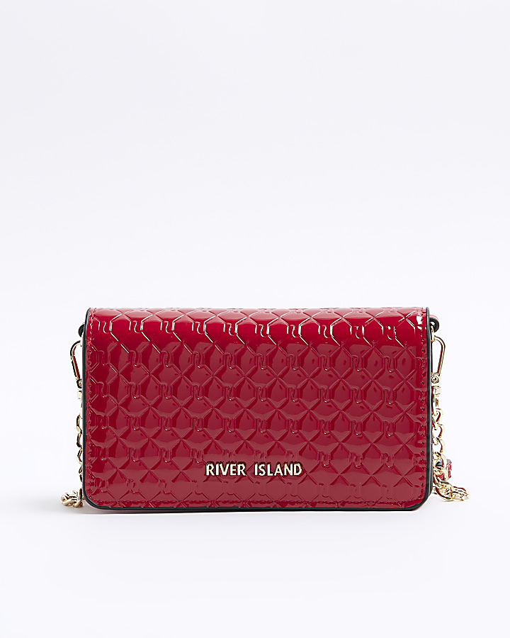 Red embossed cross body purse