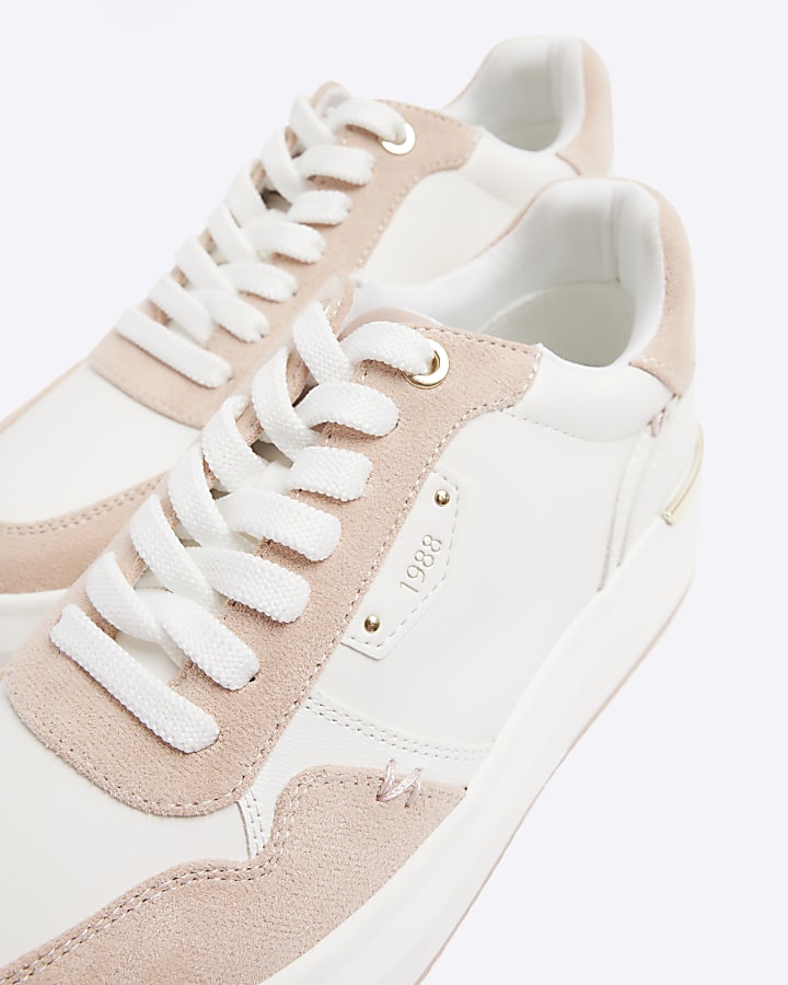 Pink lace up trainers